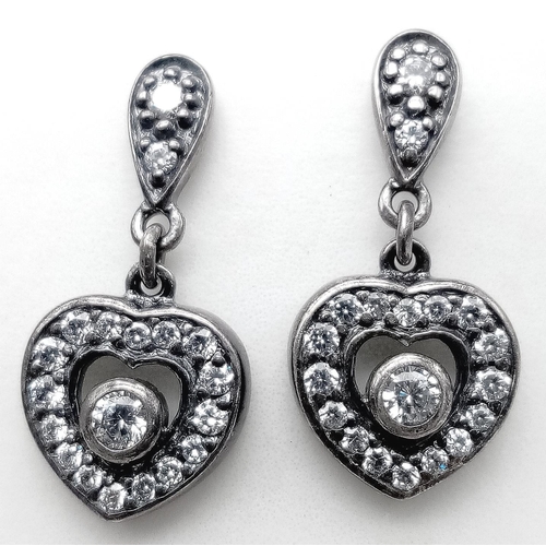 947B - A set of 925 silver Cubic Zirconia heart jewellery include a pair of earrings, a pendant and a 19cm ... 