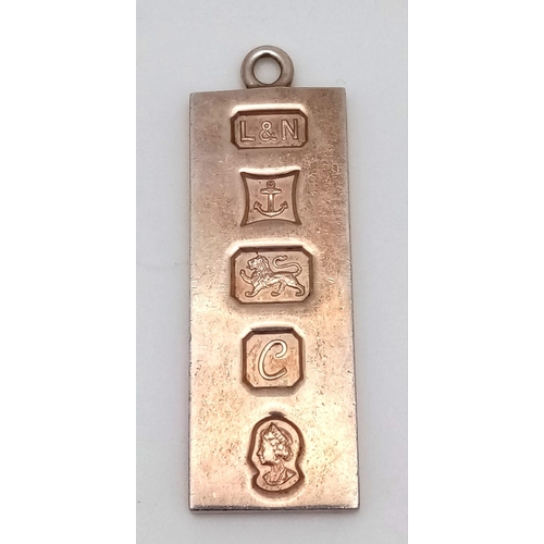 113 - A vintage sterling silver ingot pendant (2X5cm). Full Birmingham hallmarks, 1977. Total weight28G.