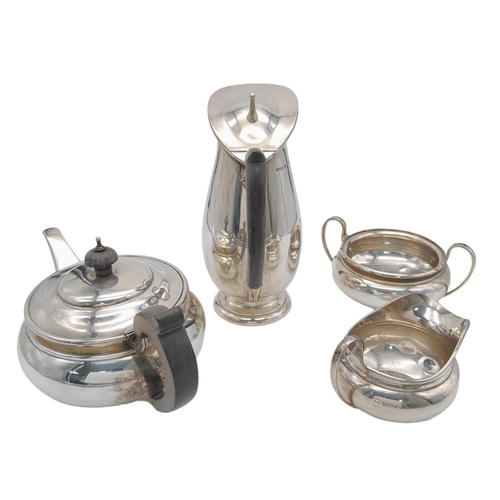 157 - An Antique Sterling Silver Art Deco Tea-Set. Includes: Teapot, hot water pitcher, cream and sugar ju... 