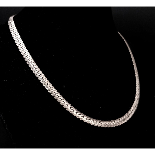 91 - A vintage 925 silver snake link necklace. Total weight 19.3G. Total length 39cm.