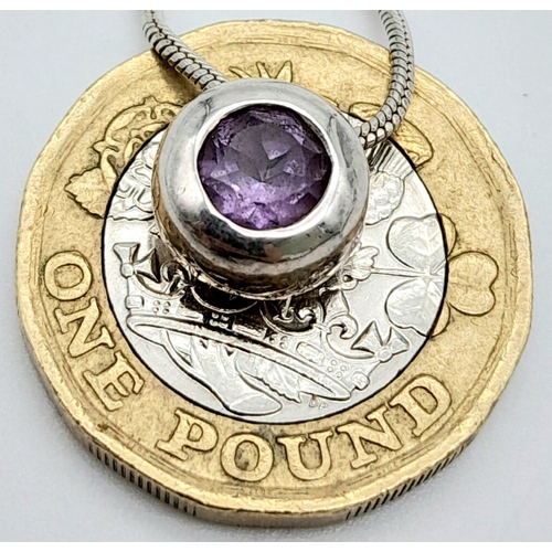 62 - A fancy 925 silver Amethyst pendant on silver snake  chain. Total weight 5G. Total length 42cm.