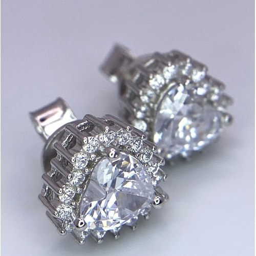 944B - A Pair of Silver Cluster Stud Earrings - Set with heart-shaped CZ and a halo of CZ.