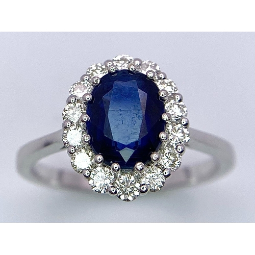 945B - A Certified 18K White Gold Oval Blue Kyanite and Round Brilliant Cut Diamond Cluster Ring. Kyanite -... 