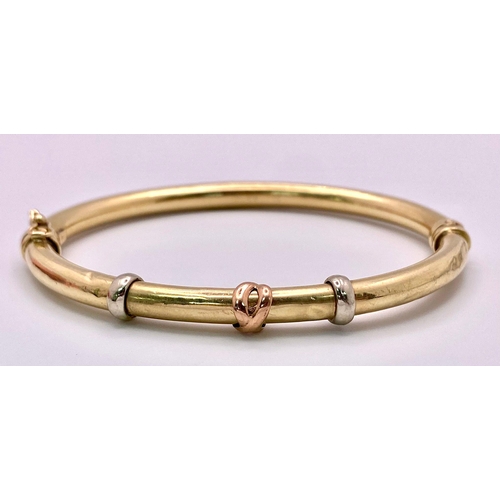 395 - A 9K Yellow Gold Vintage Torque Bangle. 6cm inner diameter. 8.16g weight.