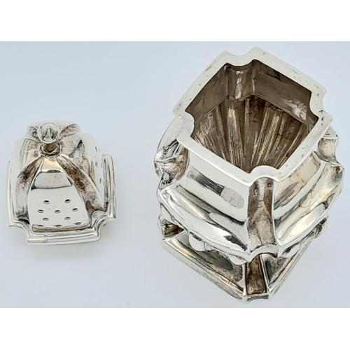 49 - An antique sterling silver salt and pepper shaker. Full hallmarks Birmingham, 1898. Total weight 41.... 