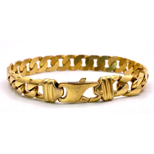 72 - A Chunky 9K Yellow Gold Flat Curb Link Bracelet. 19cm. 37.2g weight