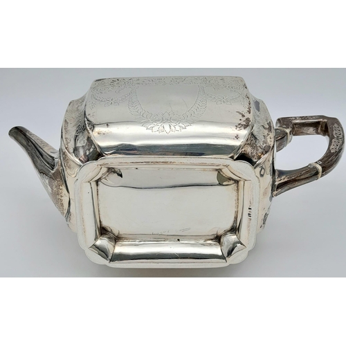 30 - An Antique Sterling Silver Teapot by Atkin Brothers of Sheffield. Rectangular shape with floral deco... 