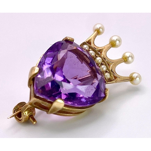 484 - A Spectacular Vintage 9K Yellow Gold, Amethyst and Seed Pearl Crown Brooch. A central heart amethyst... 