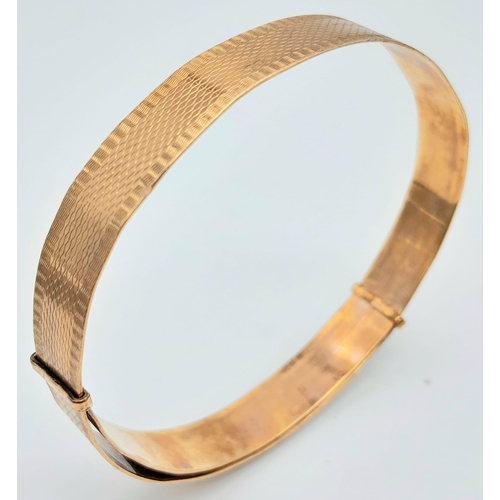 63 - An Albion 9K gold with metal core adjustable bangle. Total weight 10.8G. Please see photos for detai... 