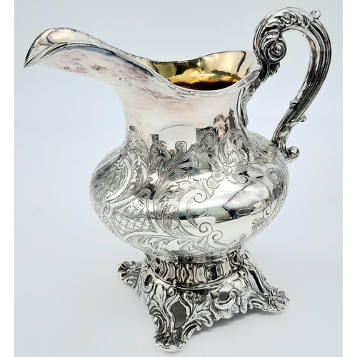 660 - A Three-Piece Antique Silver Plated Tea Set. Includes a teapot, creamer and sugar bowl - with gilded... 