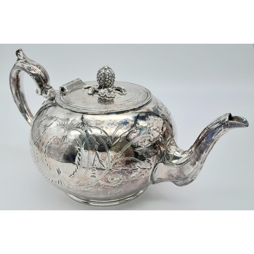 660 - A Three-Piece Antique Silver Plated Tea Set. Includes a teapot, creamer and sugar bowl - with gilded... 