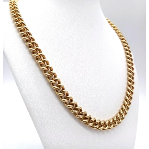 2 - A Heavy 9K Yellow Gold Curb Link Chain. 121.05g weight.
60cm length. Full UK hallmark.