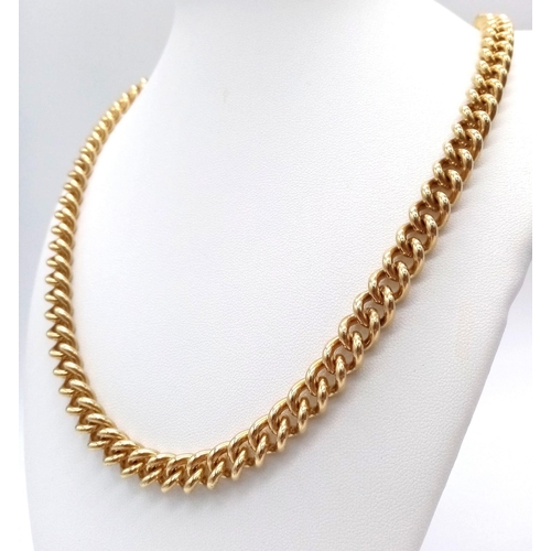 2 - A Heavy 9K Yellow Gold Curb Link Chain. 121.05g weight.
60cm length. Full UK hallmark.