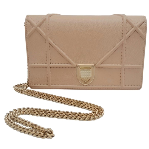 1082 - A Christian Dior Blush Leather Small Handbag. Decorative leather with rose gold tone furniture. Zipp... 