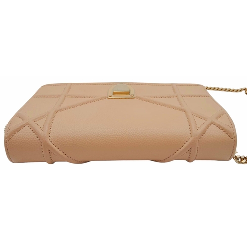 1082 - A Christian Dior Blush Leather Small Handbag. Decorative leather with rose gold tone furniture. Zipp... 