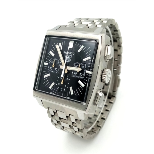 865 - A Tag Heuer Monaco Chronograph Gents Watch. Stainless steel bracelet and case - 39mm width. Black di... 