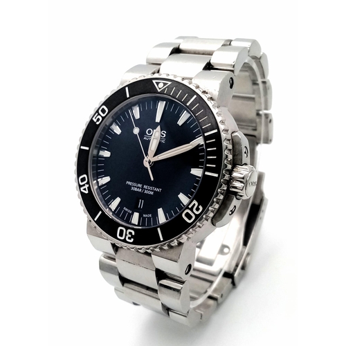 An Oris Automatic Gents Divers Watch. Stainless steel bracelet and