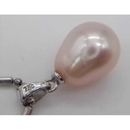 1078 - A sterling silver chain necklace with a tear drop shaped natural pearl pendant. Chain length: 44 cm,... 