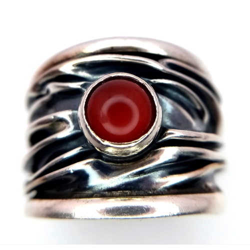 1097 - A Sterling Silver Mexican Ruby Set Bark Pattern Ring Size L. The Ring Measures 1.6cm Wide at the Cro... 