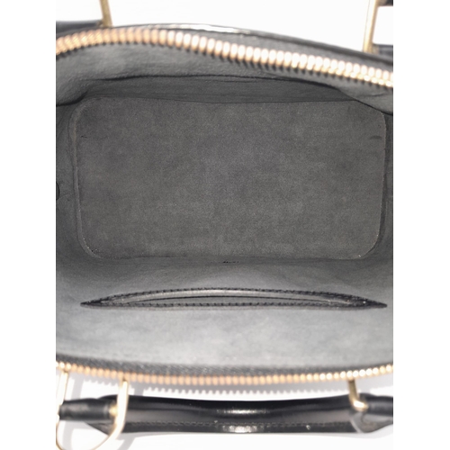 235 - A Louis Vuitton Black Leather Alma Handbag. Textured exterior. Soft textile interior with one open p... 