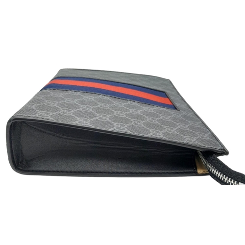 242 - A Gucci GG Supreme Pouch Canvas Bag. Monogram exterior with blue and red stripes. Beige textile inte... 