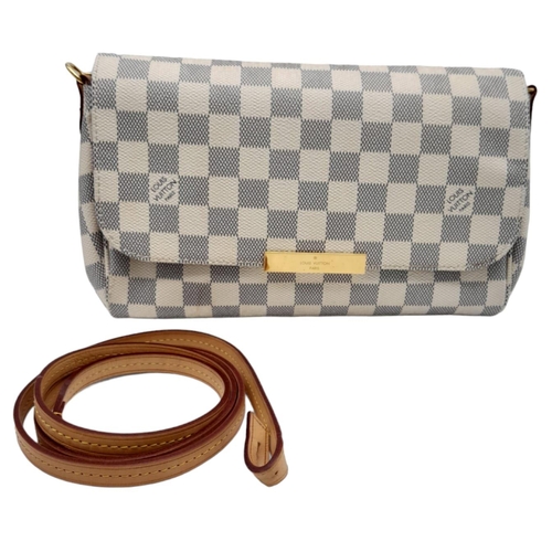 291 - A Louis Vuitton Crossbody Bag. Checked leather exterior with gold tone hardware. Textile interior wi... 