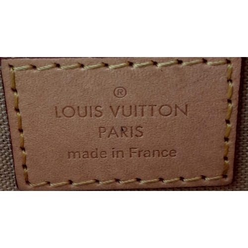 291 - A Louis Vuitton Crossbody Bag. Checked leather exterior with gold tone hardware. Textile interior wi... 