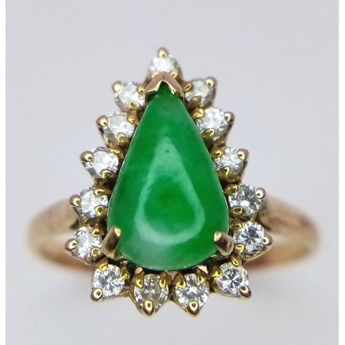 305 - An 18K Gold Jade and Diamond Ring. Central teardrop jade with a diamond surround. Size M. 2.73g tota... 