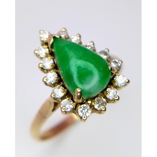 305 - An 18K Gold Jade and Diamond Ring. Central teardrop jade with a diamond surround. Size M. 2.73g tota... 