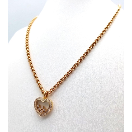 32 - A Chopard 18K Yellow Gold and Floating Diamond Heart Pendant on an 18K Yellow Gold Belcher Link Neck... 