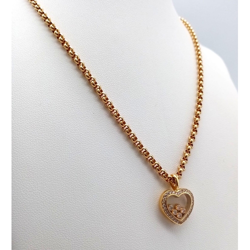 32 - A Chopard 18K Yellow Gold and Floating Diamond Heart Pendant on an 18K Yellow Gold Belcher Link Neck... 