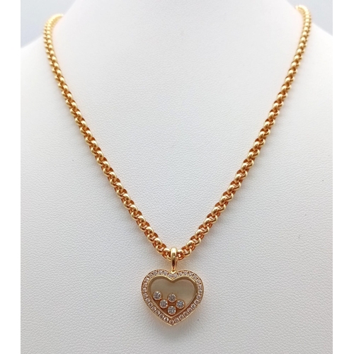 32 - A Chopard 18K Yellow Gold and Floating Diamond Heart Pendant on an 18K Yellow Gold Belcher Link Neck... 