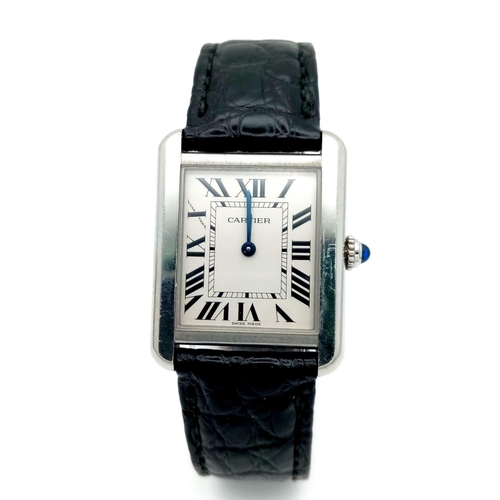 4 - A Very Collectible Cartier 3170 Quartz Ladies Watch. Black leather strap with Cartier clasp. Stainle... 