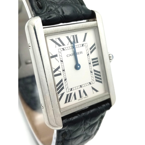 4 - A Very Collectible Cartier 3170 Quartz Ladies Watch. Black leather strap with Cartier clasp. Stainle... 