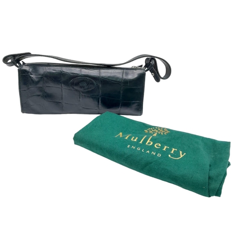 445 - A Black Leather Mulberry Baguette Bag. Textured exterior with Mulberry logo. Decorative textile inte... 