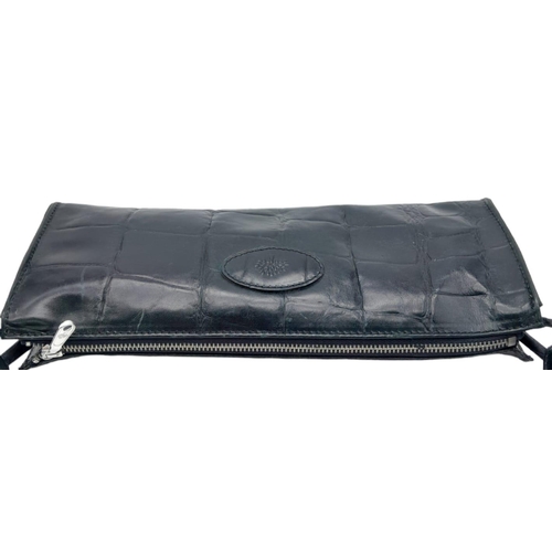 445 - A Black Leather Mulberry Baguette Bag. Textured exterior with Mulberry logo. Decorative textile inte... 