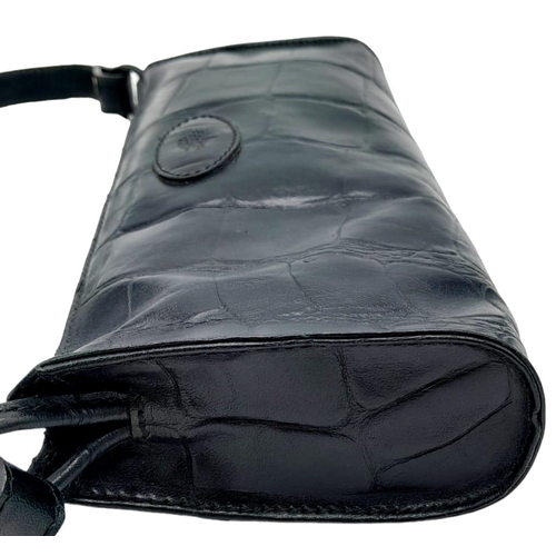 445 - A Black Leather Mulberry Baguette Bag. Textured exterior with Mulberry logo. Decorative textile inte... 