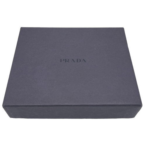 459 - A Prada Mini Wallet/Purse. 10 x 8cm. Comes with original Prada box. Ref: 14611