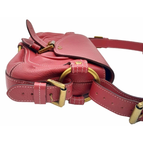 466 - A Mulberry Burgundy Leather Flap Hand/Shoulder bag. Belt buckle fastener. Gold-tone hardware. 26cm l... 