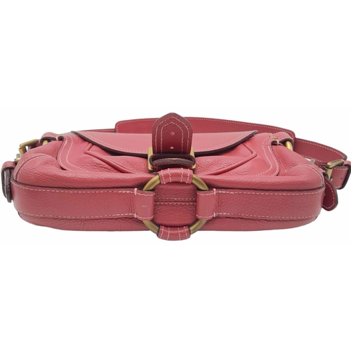 466 - A Mulberry Burgundy Leather Flap Hand/Shoulder bag. Belt buckle fastener. Gold-tone hardware. 26cm l... 