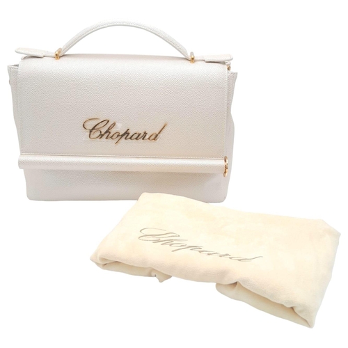 473 - A Chopard Cream Leather Ladies Handbag. Textured exterior with gold tone hardware and Chopard logo. ... 