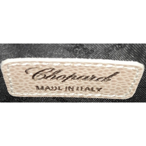 473 - A Chopard Cream Leather Ladies Handbag. Textured exterior with gold tone hardware and Chopard logo. ... 