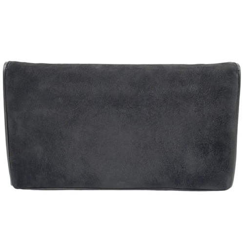 480 - A Gucci Black Suede Clutch Bag. Soft exterior with a gilded G clasp. Black textile interior with a z... 