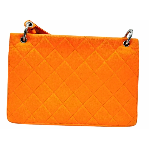 74 - A Chanel Quilted Orange Caviar Leather Shoulder Bag. Quilted pattern exterior with gunmetal hardware... 