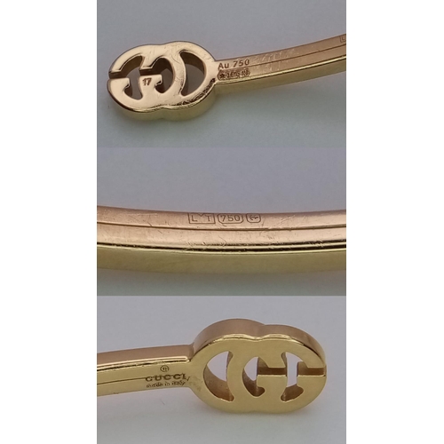 99 - An 18K Yellow Gold Gucci Designer Cuff Bangle. Comes with a variety of plush Gucci packaging items. ... 