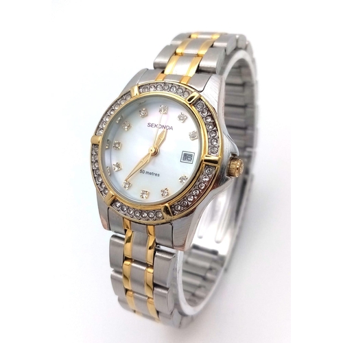 1104 - A Ladies Unworn, Stone Set Bezel & Face, Bi-Metal Sekonda Quartz Date Watch.  32mm Including Crown. ... 