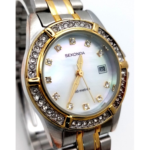 1104 - A Ladies Unworn, Stone Set Bezel & Face, Bi-Metal Sekonda Quartz Date Watch.  32mm Including Crown. ... 