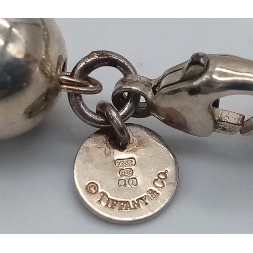 298 - A Tiffany and Co. Matching Ball Link Necklace and Bracelet Set. Silver makers mark Tiffany clasps. 9... 