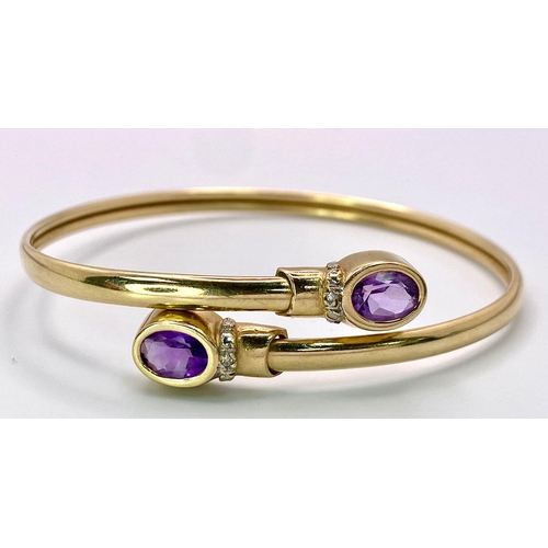 391 - A 9K yellow gold diamond and amethyst torque bangle.7g, 6cm diameter (amy:1.70ct/dia:0.01ct)

ref: S... 