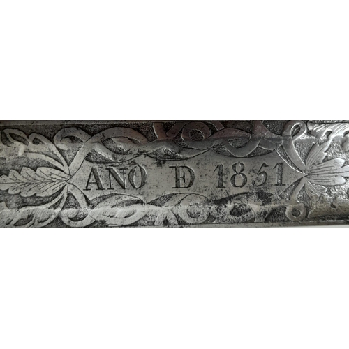 402 - A Toledo Straight Edge Cavalry Sword with Scabbard. Markings on blade of Ano D 1851. Some rusting on... 